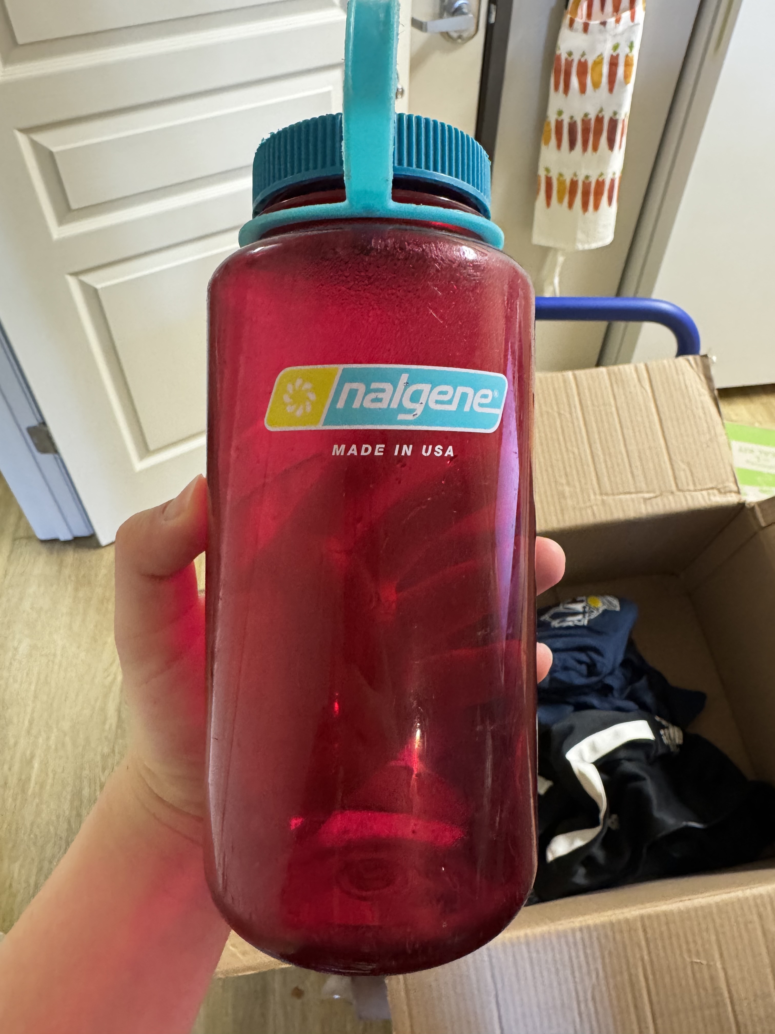 Red Nalgene water bottle